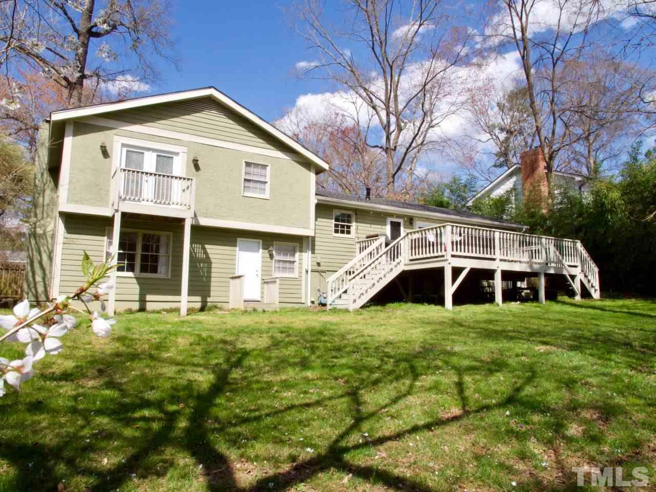 2002 Port Royal Road Raleigh, NC 27609 - Photo 23 of 23 a front view of a house with a yard