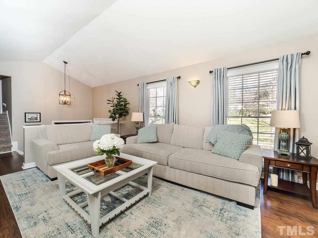 2002 Port Royal Road Raleigh, NC 27609 - Photo 8 of 23 a living room with furniture and a table