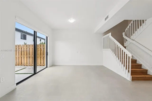 a view of an entryway with staircase