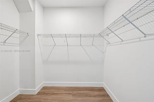 a view of a room with racks on the wall