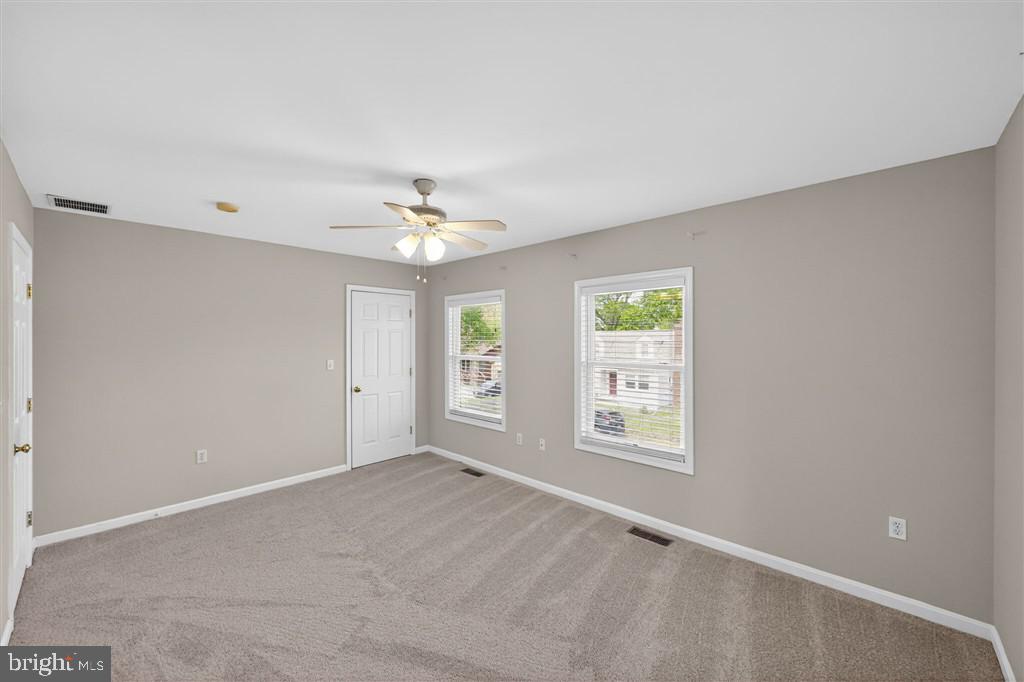 1604 Oriole Road Edgewater, MD 21037 - Photo 11 of 29 a view of an empty room with a window