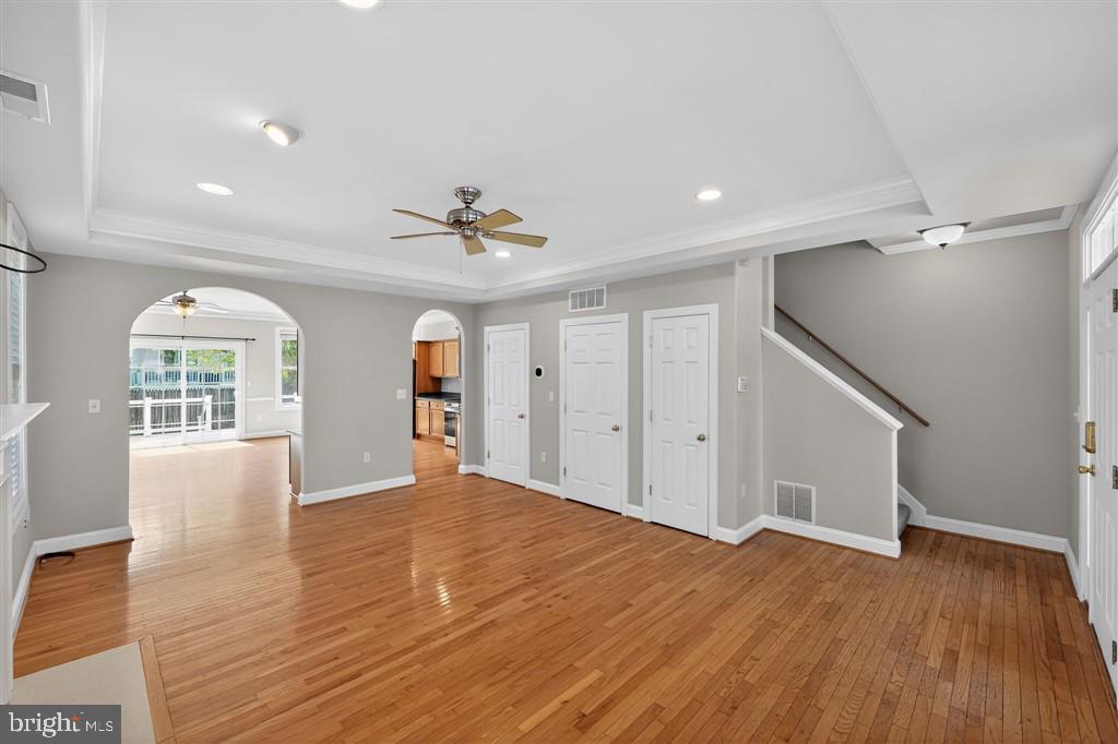 1604 Oriole Road Edgewater, MD 21037 - Photo 12 of 29 a view of empty room with wooden floor and fan