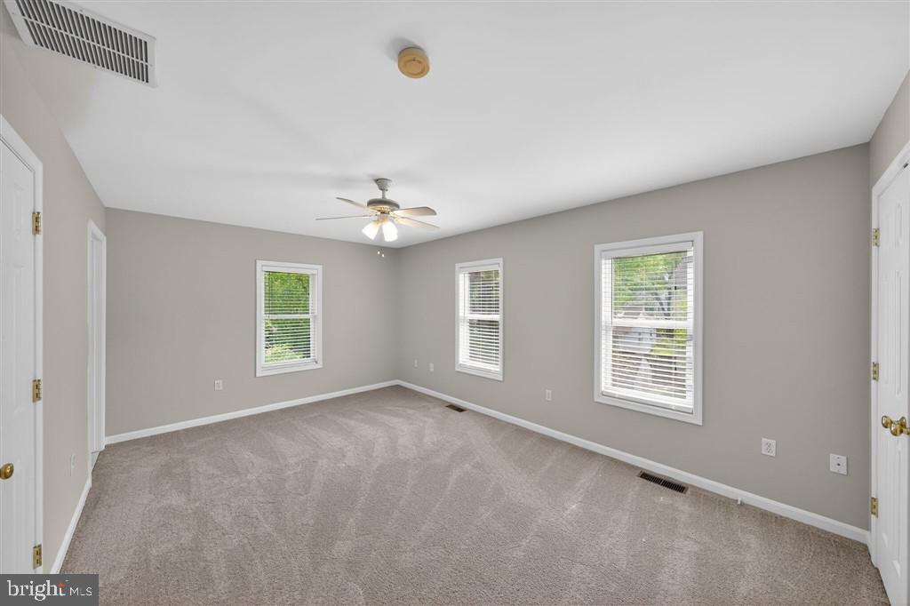 1604 Oriole Road Edgewater, MD 21037 - Photo 13 of 29 a view of an empty room with a window