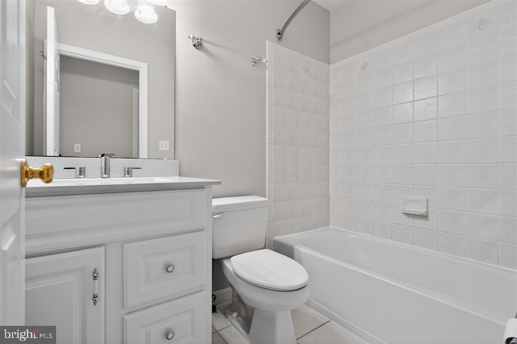 1604 Oriole Road Edgewater, MD 21037 - Photo 23 of 29 a bathroom with a sink toilet vanity and shower