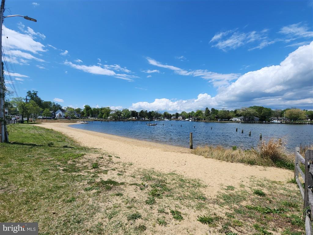 1604 Oriole Road Edgewater, MD 21037 - Photo 26 of 29 a view of a lake with a big yard