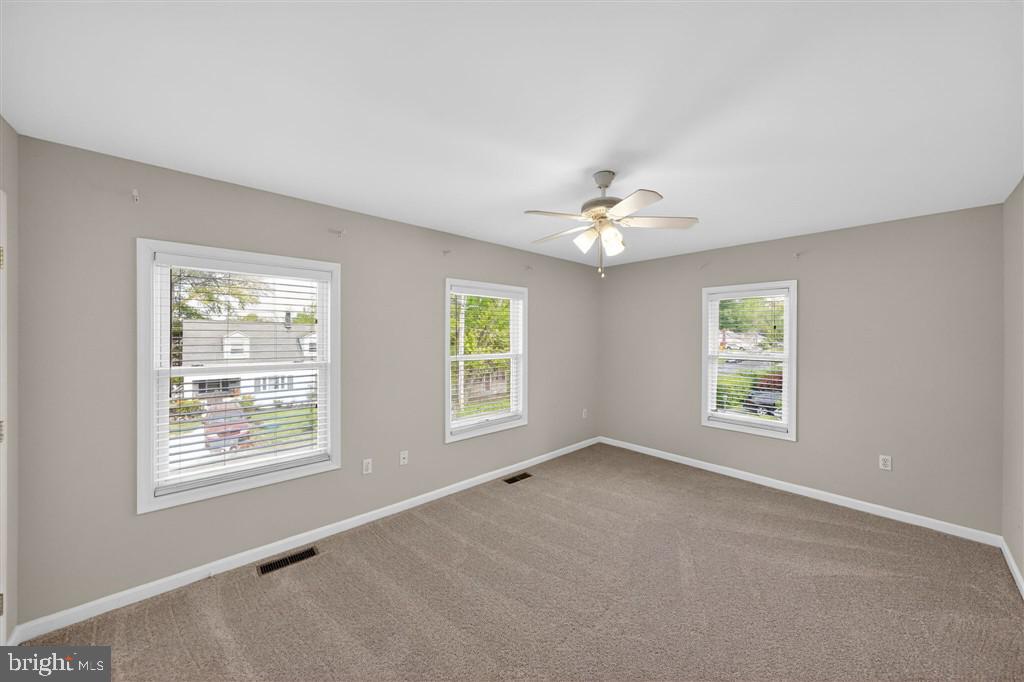 1604 Oriole Road Edgewater, MD 21037 - Photo 10 of 29 a view of an empty room with a window
