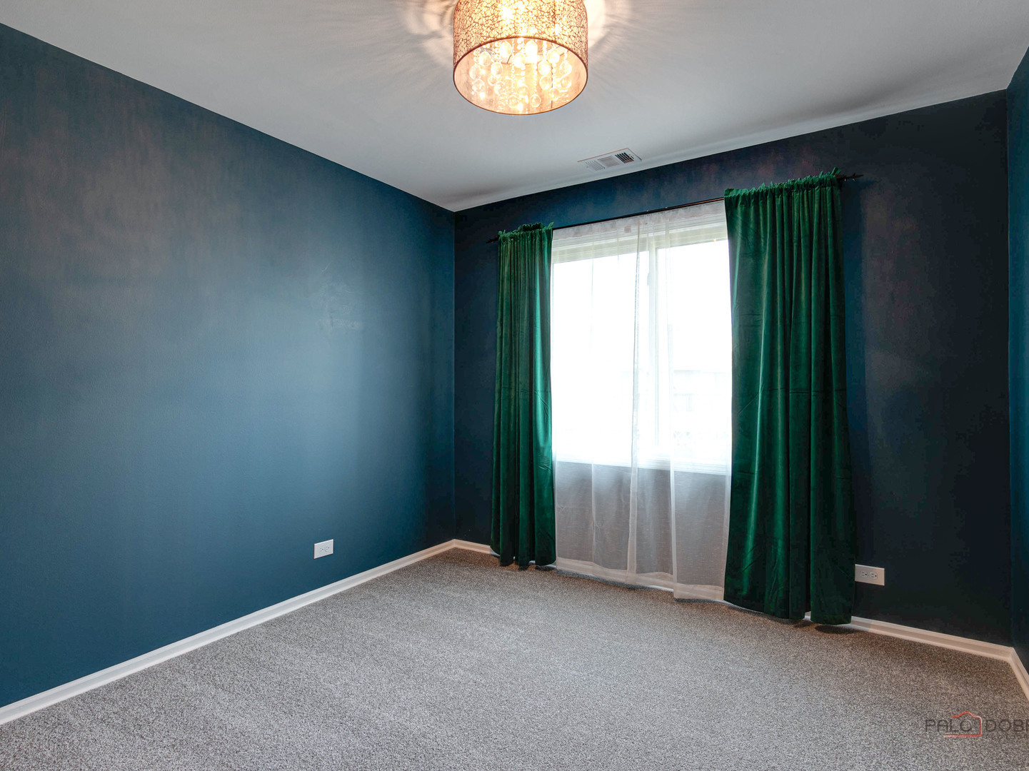 1082 Pine Tree Circle North, Unit 1082 Buffalo Grove, IL 60089 - Photo 18 of 26 an empty room with window mirror and balcony view