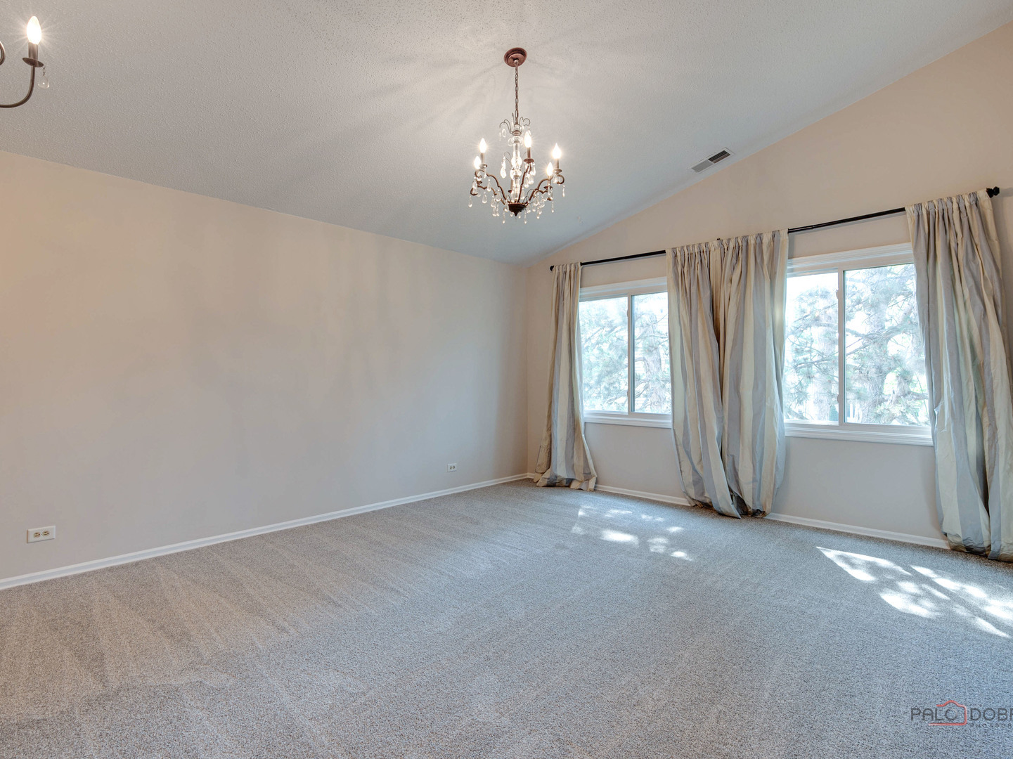 1082 Pine Tree Circle North, Unit 1082 Buffalo Grove, IL 60089 - Photo 20 of 26 a view of an empty room with a window