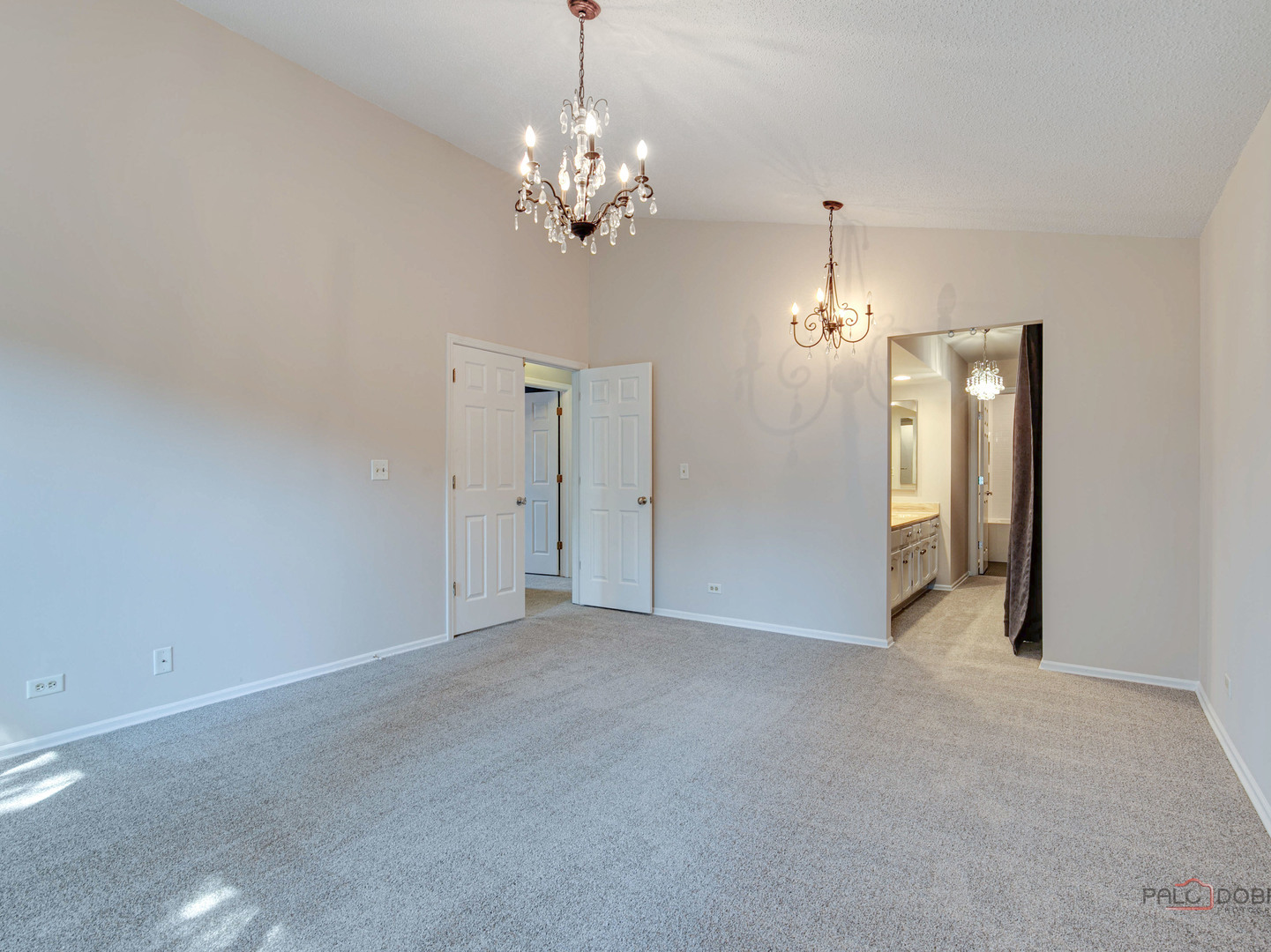 1082 Pine Tree Circle North, Unit 1082 Buffalo Grove, IL 60089 - Photo 21 of 26 a view of a chandelier in big room and chandelier