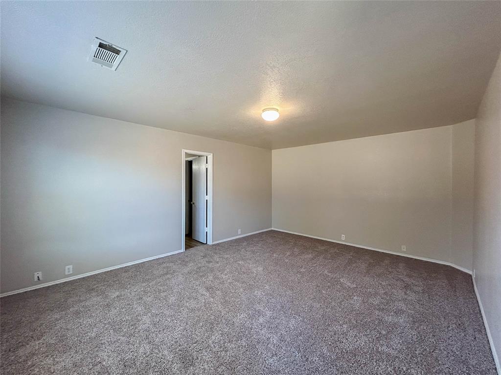 9013 Sagebrush Trail Cross Roads, TX 76227 - Photo 17 of 22 a view of an empty room