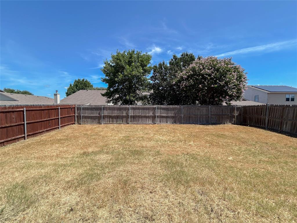 9013 Sagebrush Trail Cross Roads, TX 76227 - Photo 21 of 22 a view of a backyard