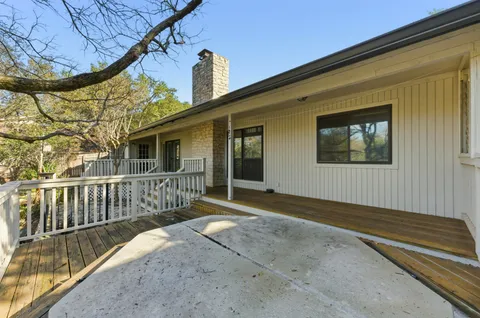 a view of balcony with wooden floor