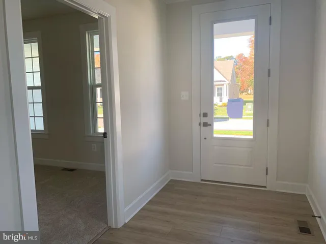 an empty room that has a window