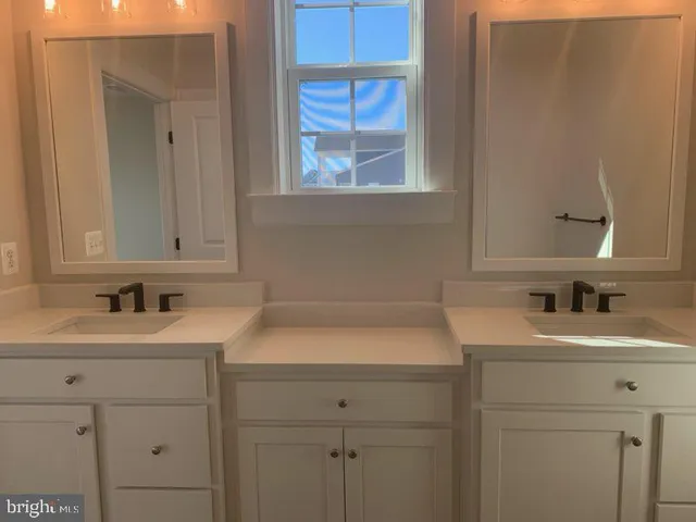 a bathroom with a sink and a vanity