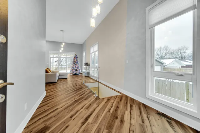 a view of a living room and hardwood floor
