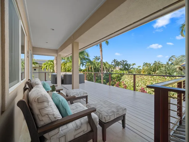 a view of balcony with furniture
