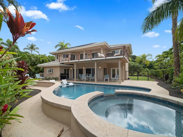 a view of a house with swimming pool