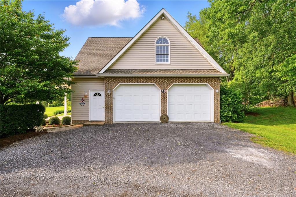 2 Car Detached Garage with large bonus room upstairs. Also includes a 3/4 bathroom!