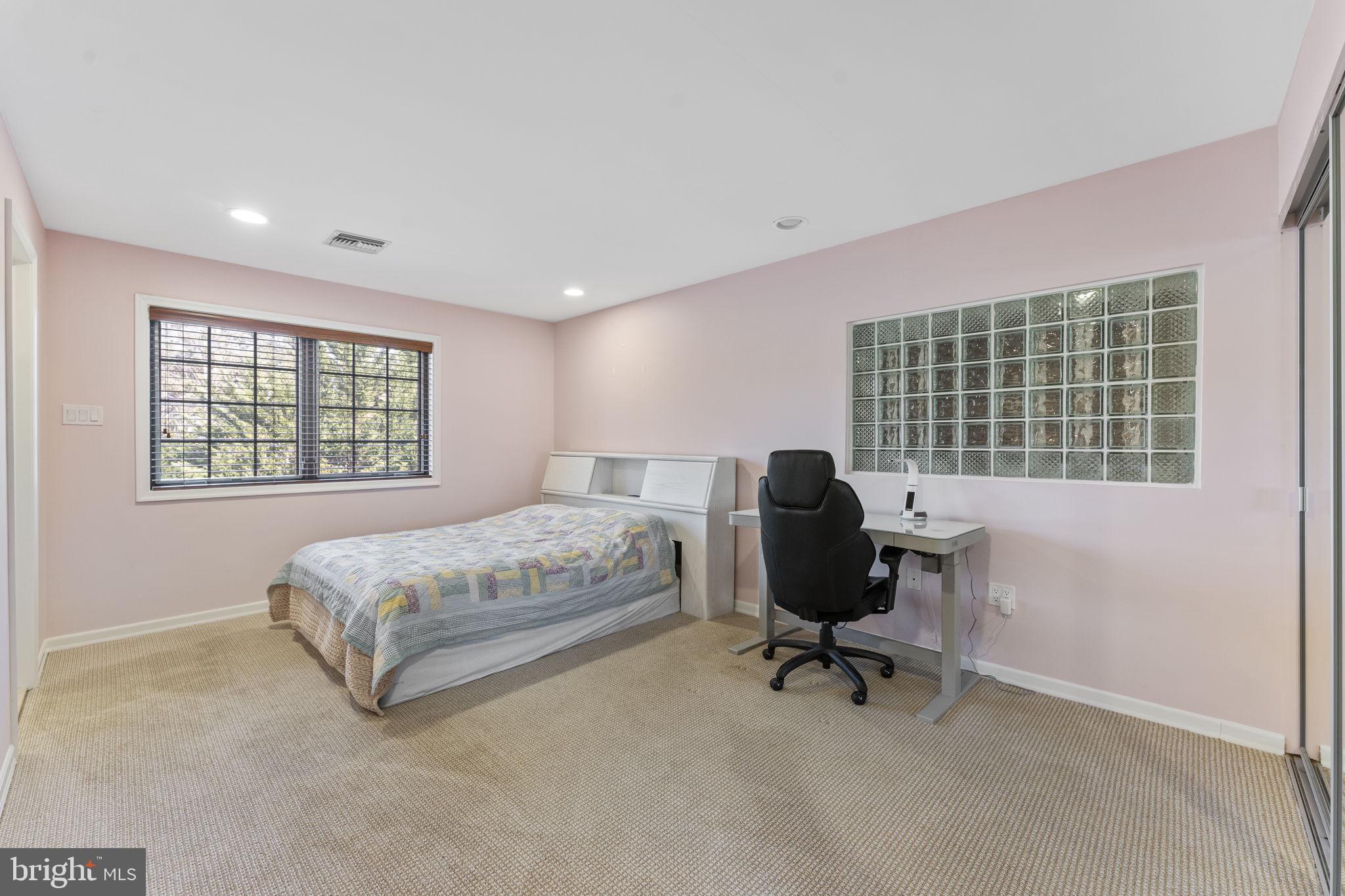 244 Mathers Road Ambler, PA 19002 - Photo 35 of 52 a bedroom with a bed and a window