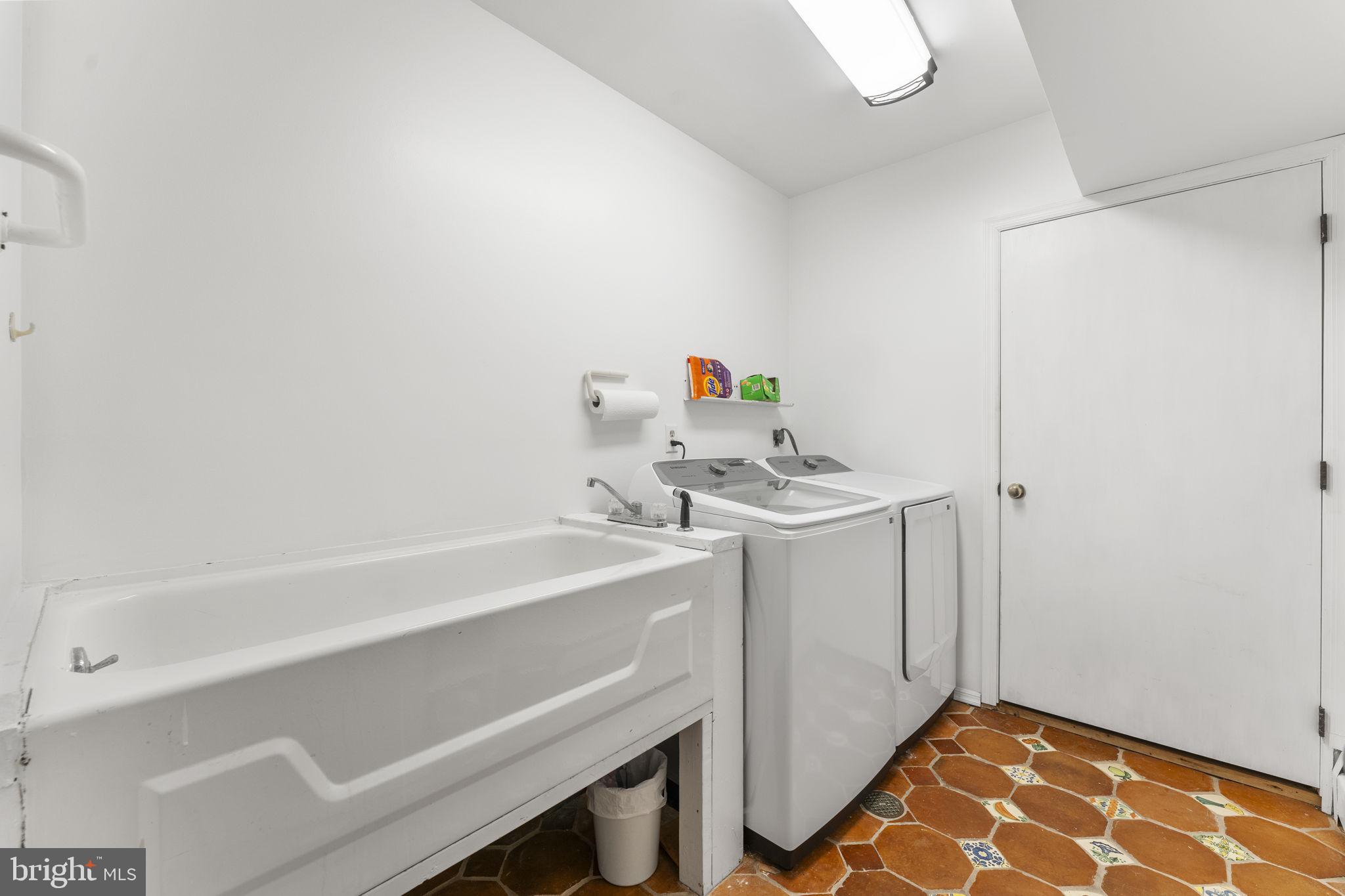 244 Mathers Road Ambler, PA 19002 - Photo 44 of 52 a utility room with dryer and washer