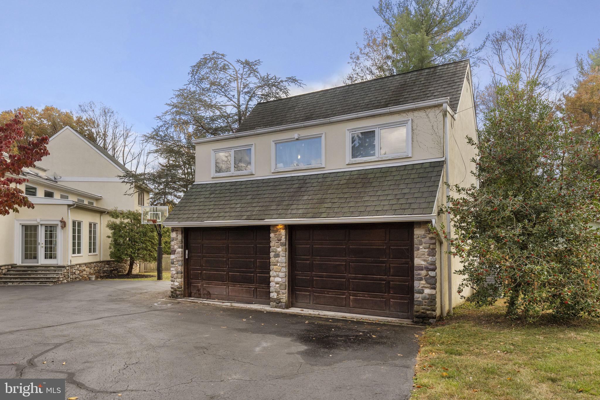 244 Mathers Road Ambler, PA 19002 - Photo 47 of 52 a front view of a house with a garage