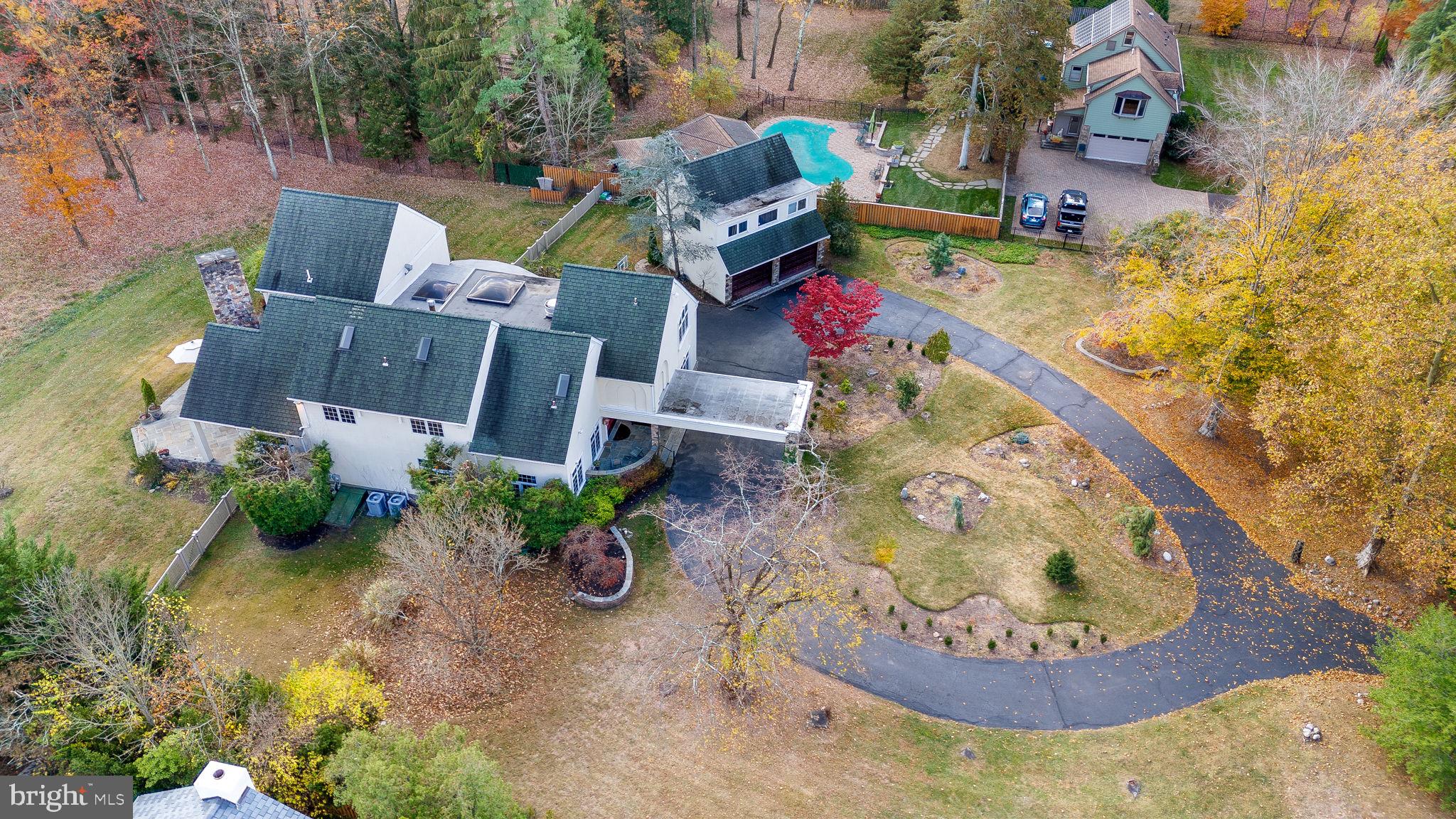 244 Mathers Road Ambler, PA 19002 - Photo 7 of 52 an aerial view of a house with a yard and a fountain