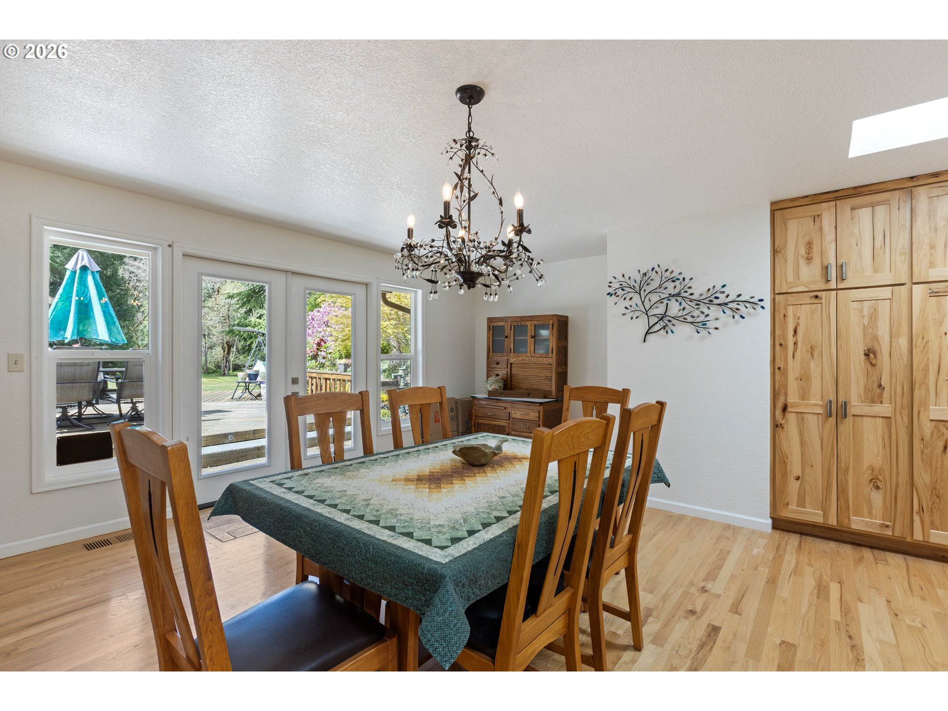 738 Elgarose Road Roseburg, OR 97471 - Photo 13 of 48 a view of a dining room with furniture window and wooden floor