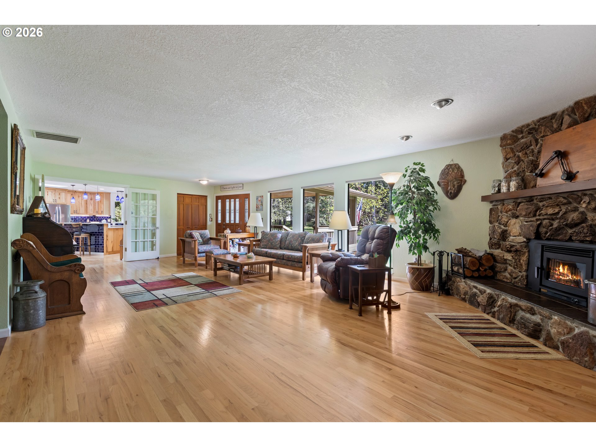 738 Elgarose Road Roseburg, OR 97471 - Photo 17 of 48 a living room with furniture and a fireplace