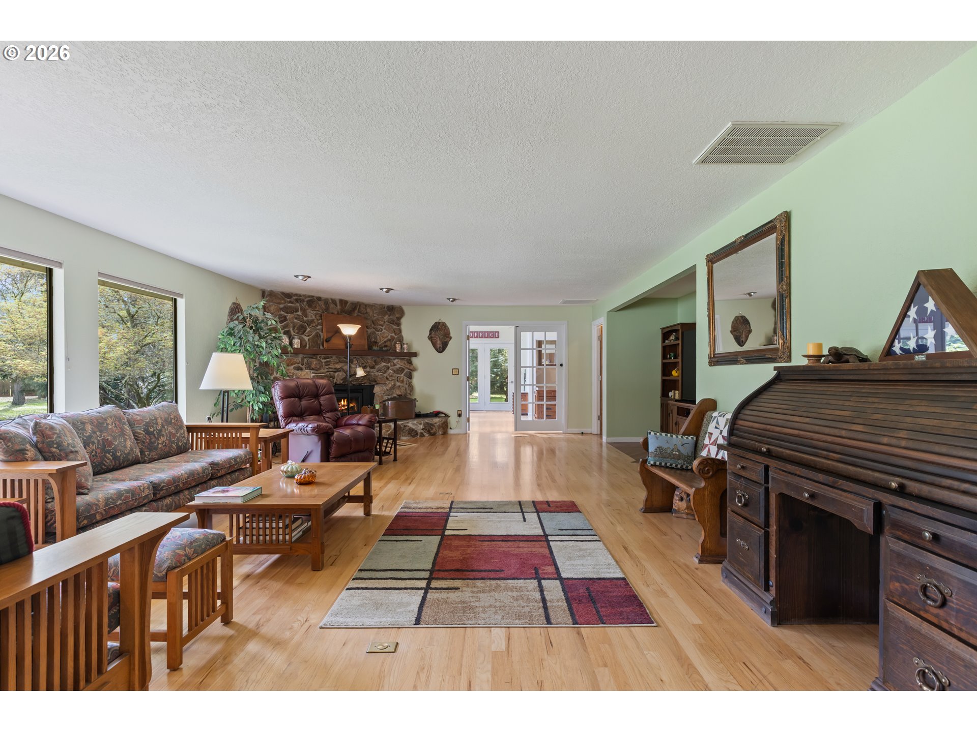 738 Elgarose Road Roseburg, OR 97471 - Photo 19 of 48 a living room with furniture and a rug