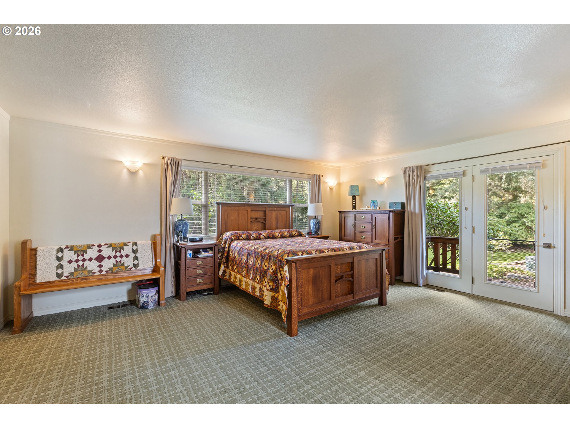 738 Elgarose Road Roseburg, OR 97471 - Photo 20 of 48 a bedroom with a bed and a large window