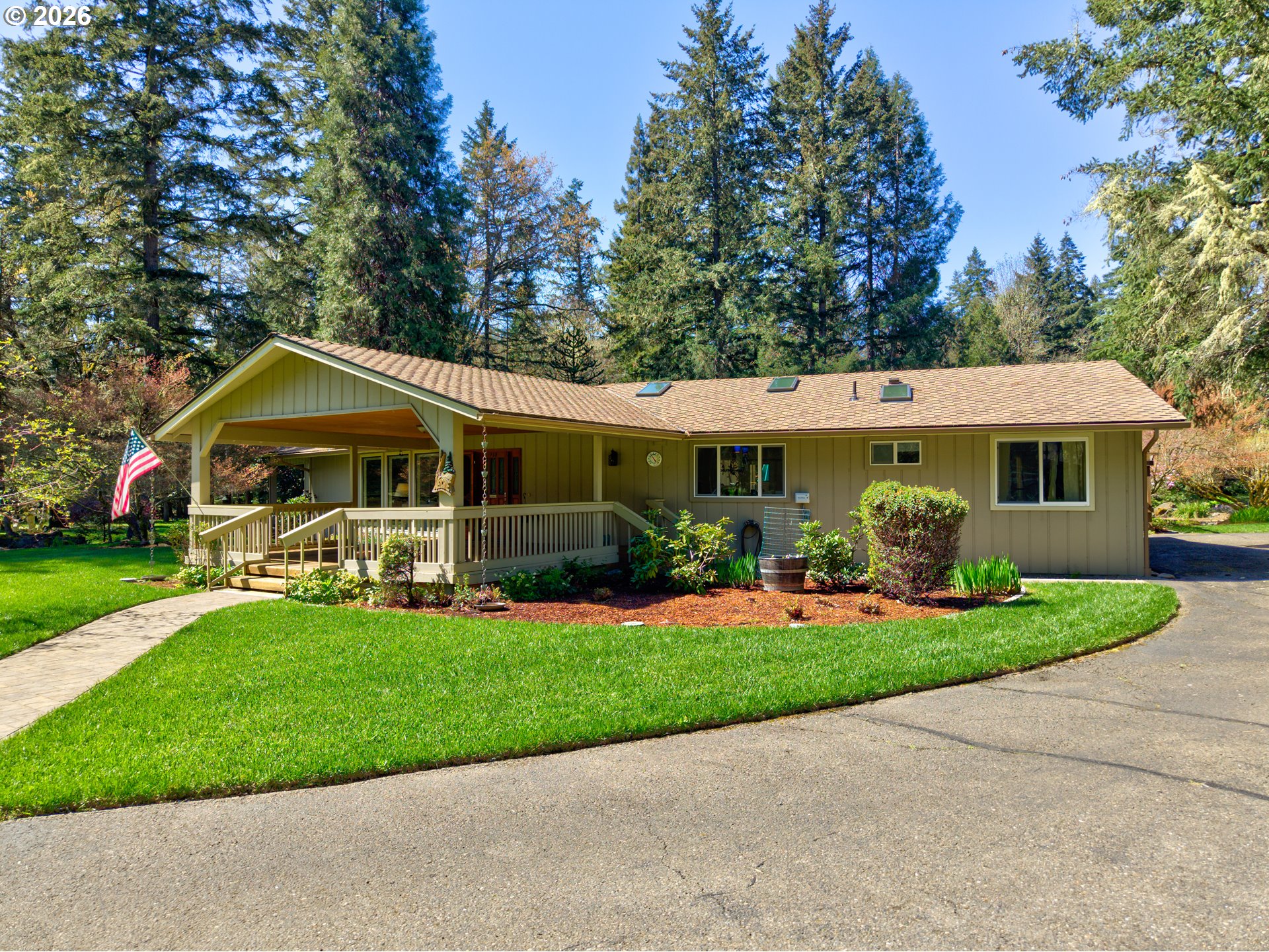 738 Elgarose Road Roseburg, OR 97471 - Photo 2 of 48 a front view of house with yard and green space