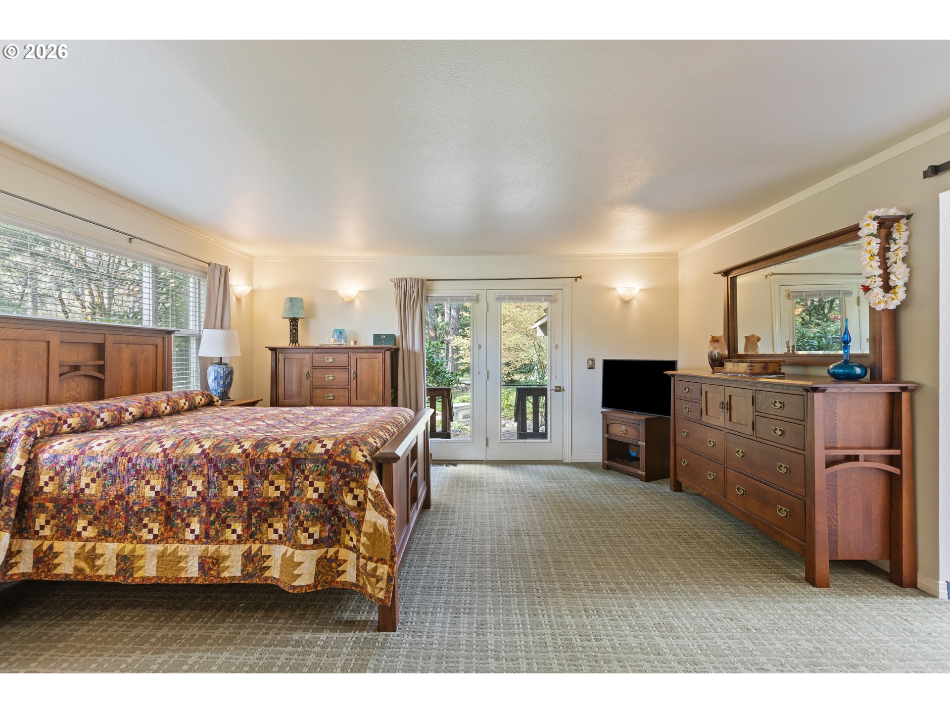 738 Elgarose Road Roseburg, OR 97471 - Photo 21 of 48 a bed room with a bed window and mirror