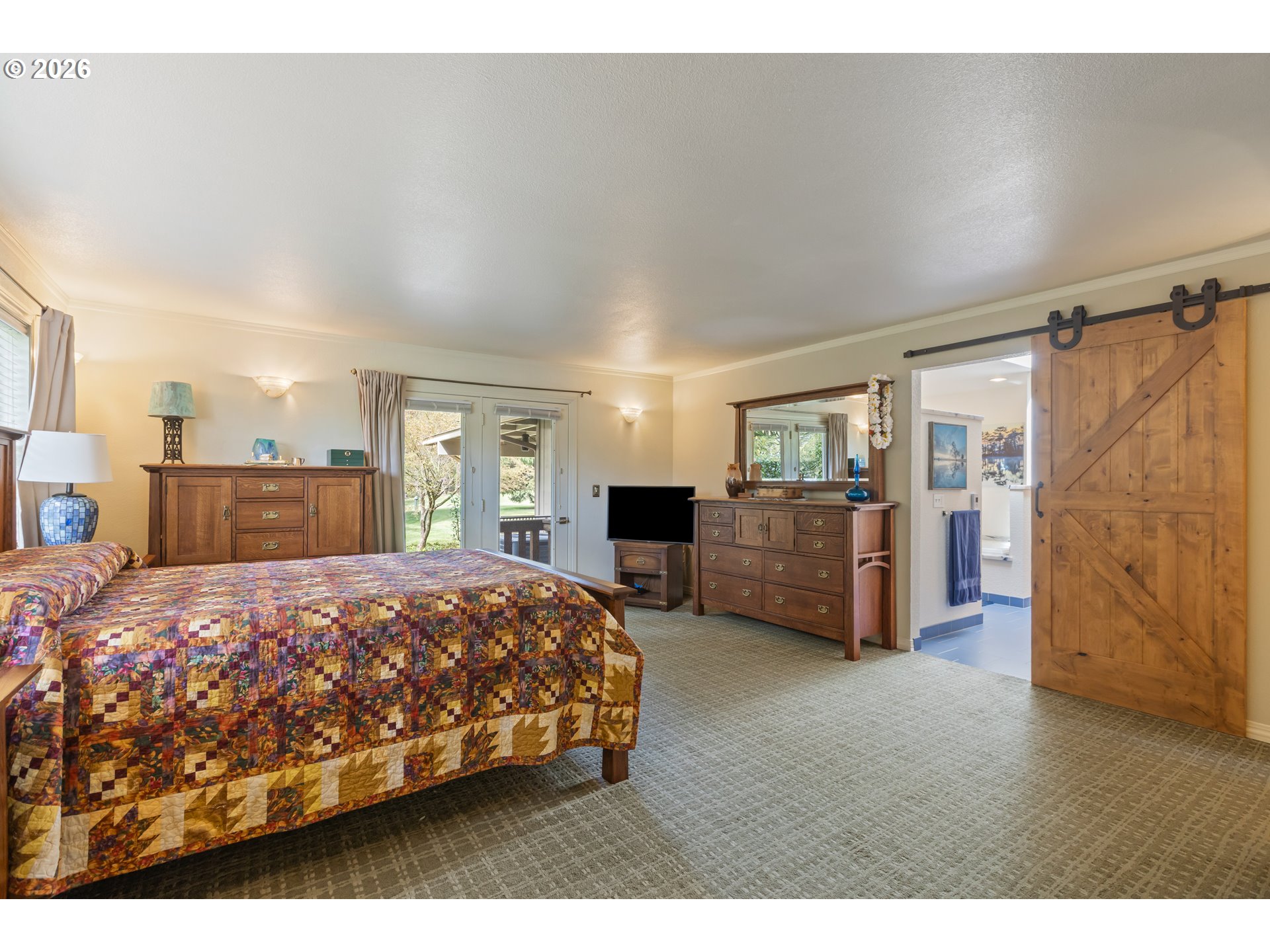 738 Elgarose Road Roseburg, OR 97471 - Photo 22 of 48 a bedroom with a large bed and a view of bedroom