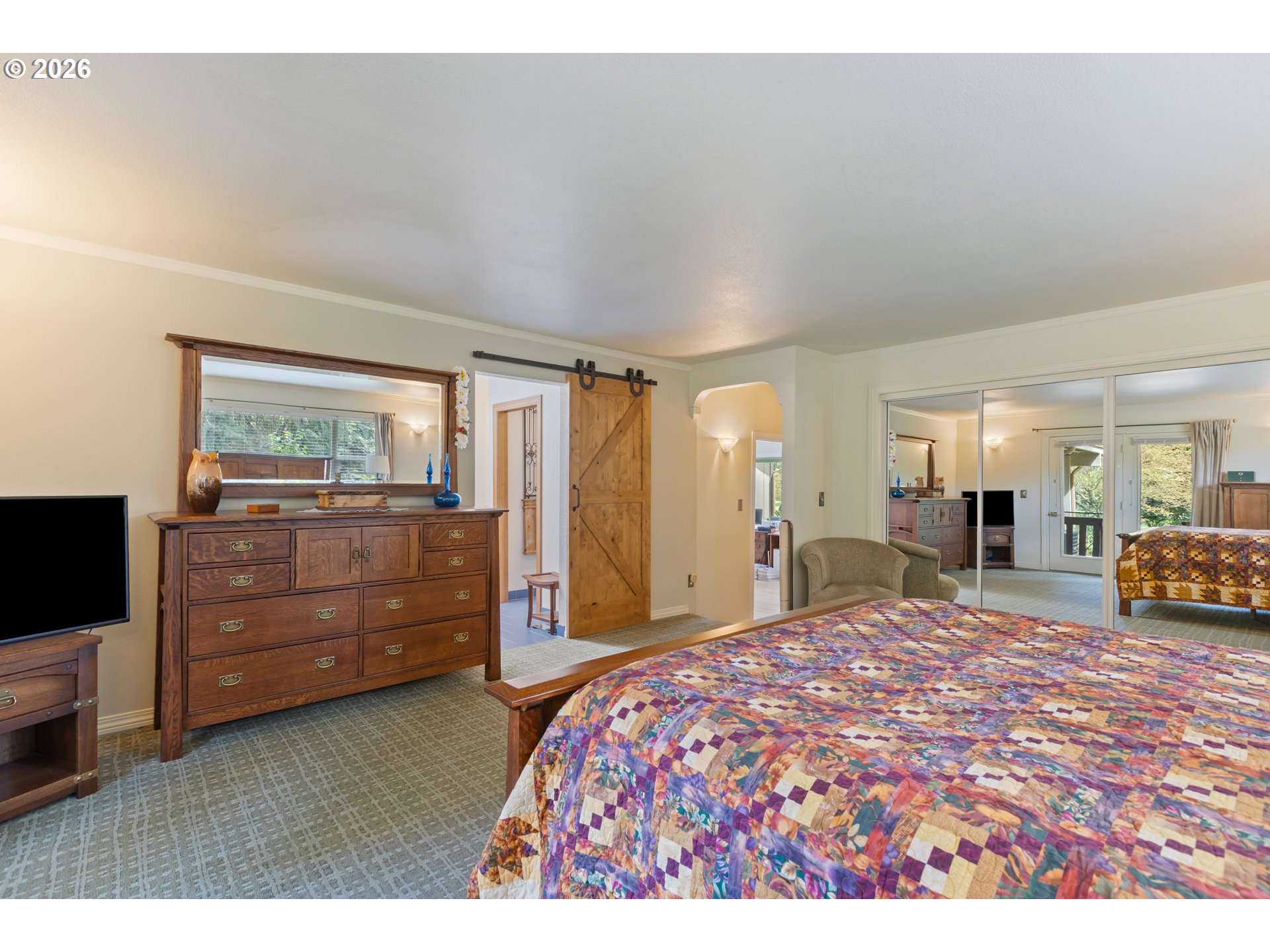 738 Elgarose Road Roseburg, OR 97471 - Photo 23 of 48 a bedroom with a bed and a large window