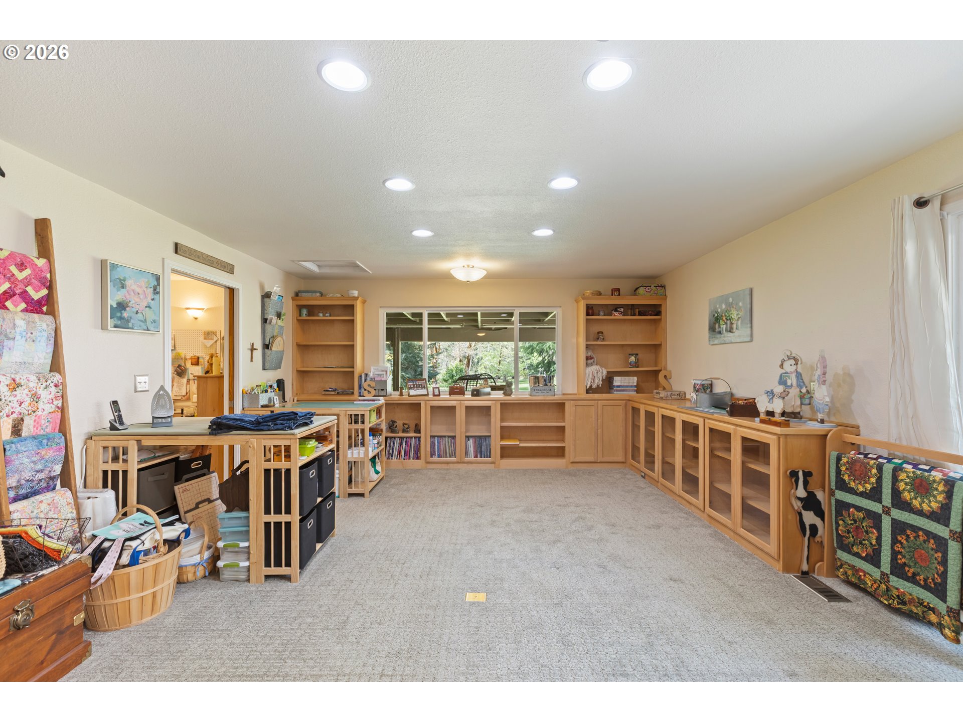 738 Elgarose Road Roseburg, OR 97471 - Photo 28 of 48 a living room with lots of furniture and clutter