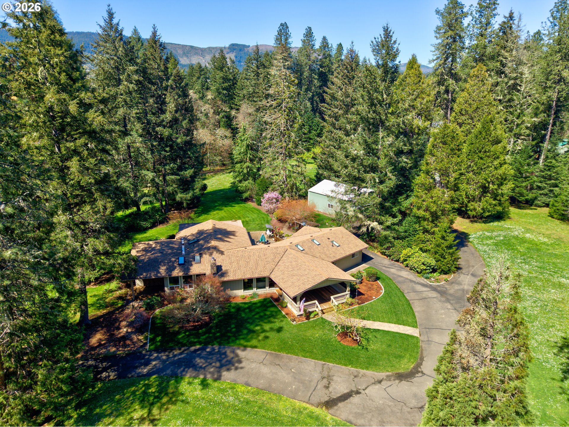 738 Elgarose Road Roseburg, OR 97471 - Photo 3 of 48 an aerial view of a house with yard swimming pool and outdoor seating
