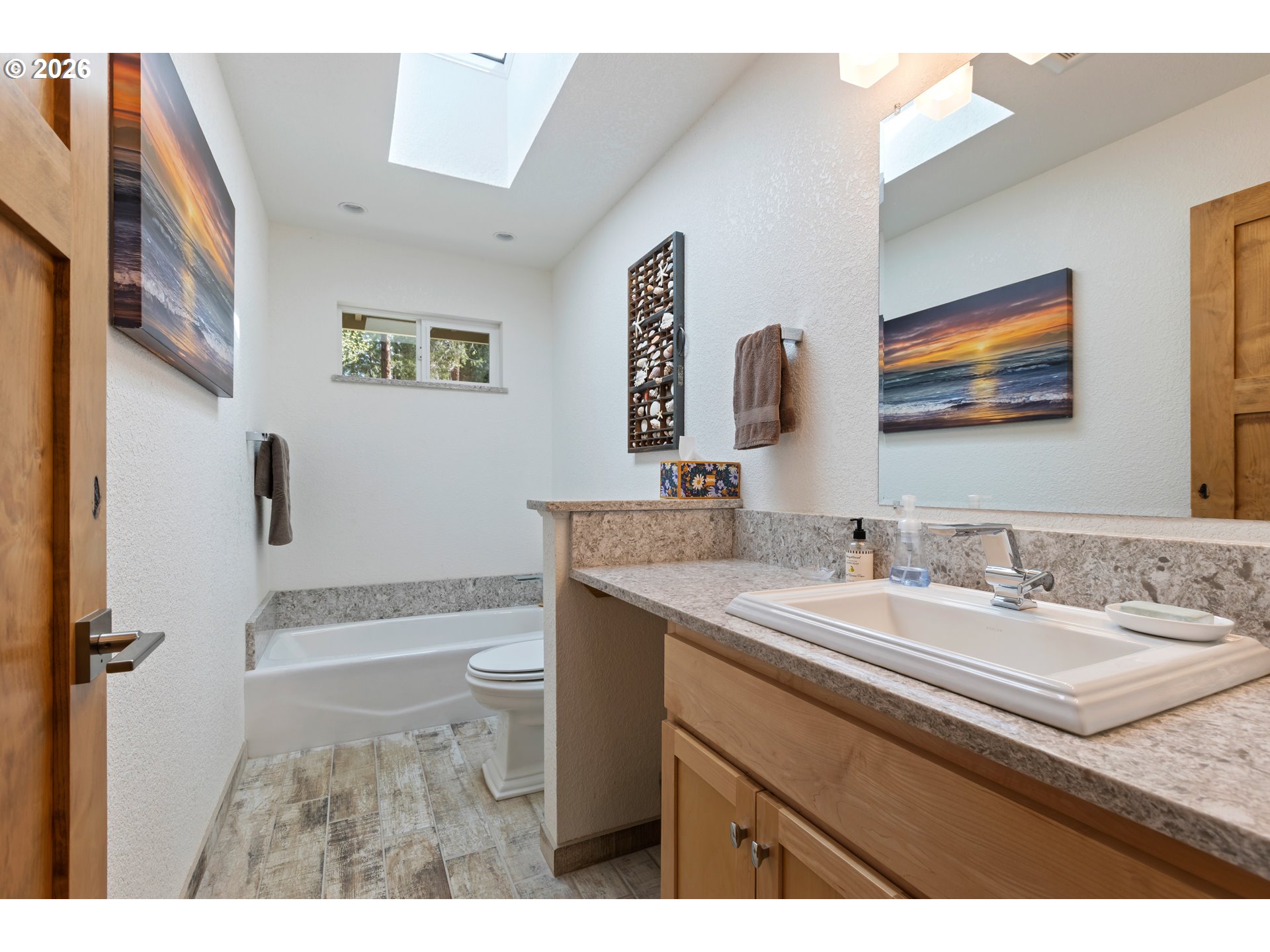 738 Elgarose Road Roseburg, OR 97471 - Photo 36 of 48 a bathroom with a sink a mirror and a toilet