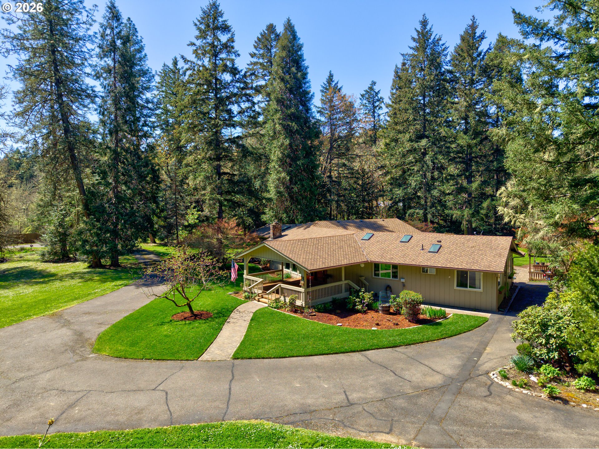 738 Elgarose Road Roseburg, OR 97471 - Photo 4 of 48 a aerial view of a house with a yard and plants
