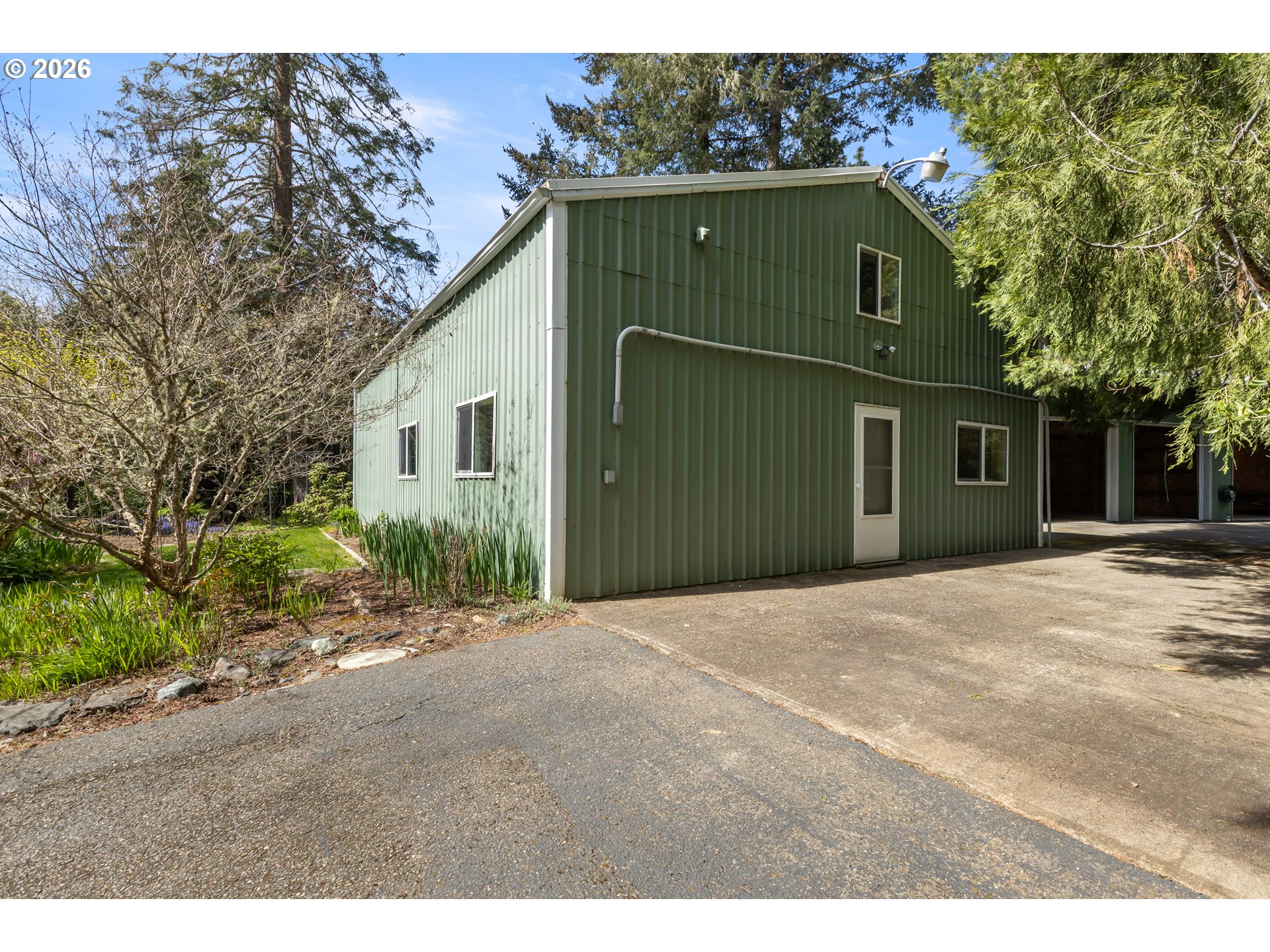738 Elgarose Road Roseburg, OR 97471 - Photo 43 of 48 a front view of a house with a yard and garage
