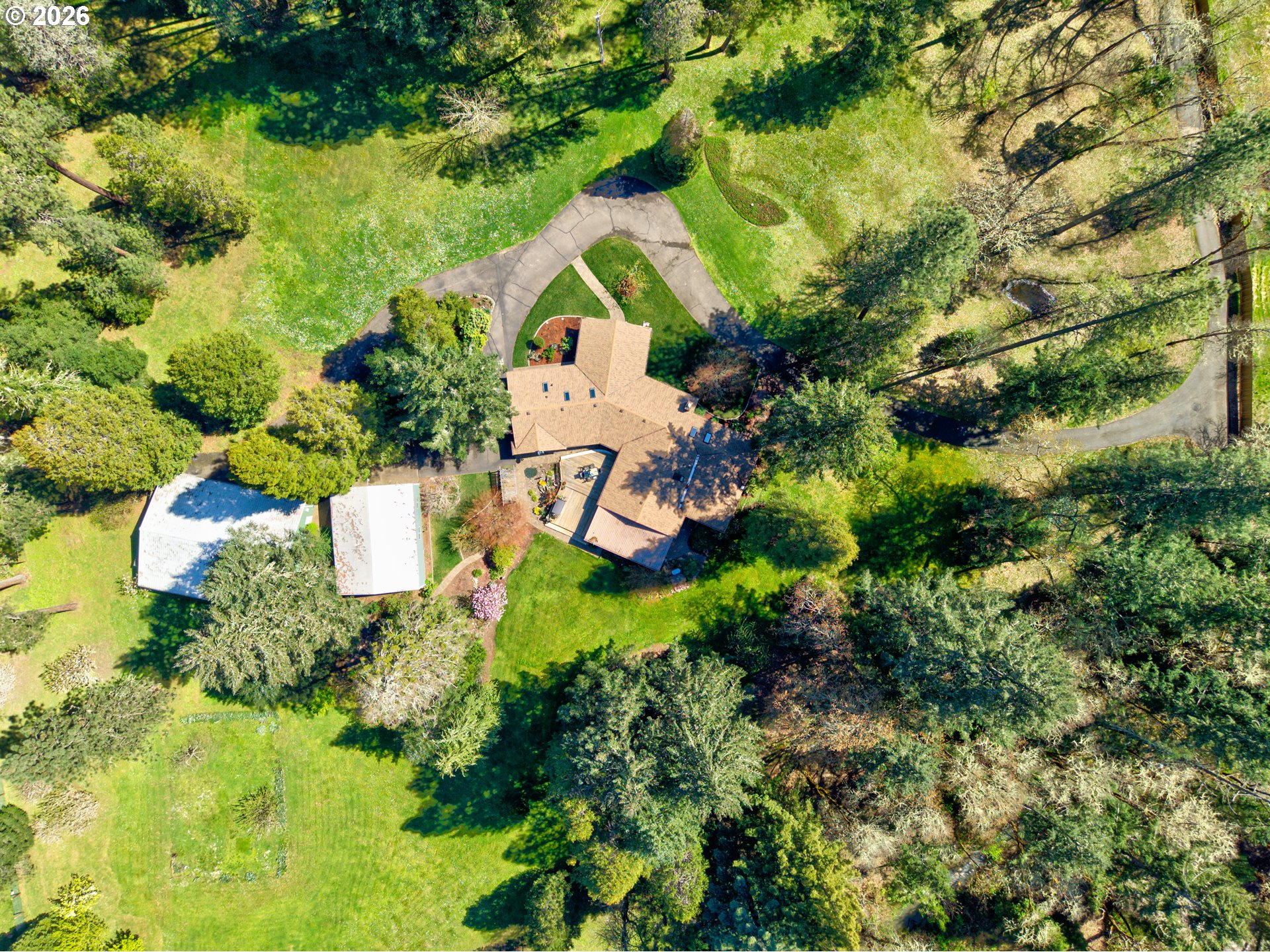 738 Elgarose Road Roseburg, OR 97471 - Photo 46 of 48 an aerial view of a house with a yard and lake view