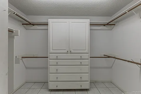 a view of a livingroom with furniture window and wooden floor