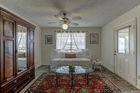 a workspace with furniture and window