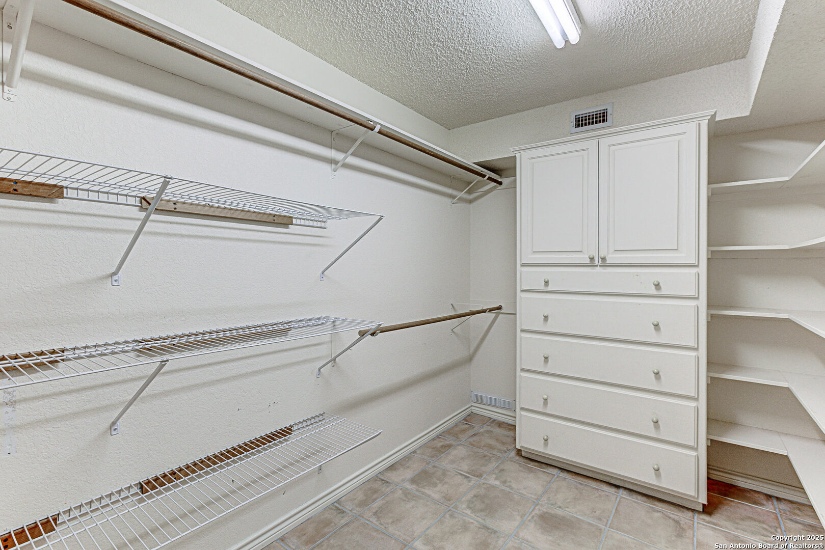 116 D Dawn, Unit D Horseshoe Bay, TX 78657 - Photo 32 of 43 a view of an empty walk in closet