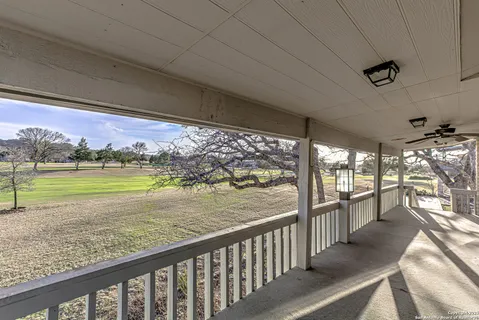 a view of a porch and garden