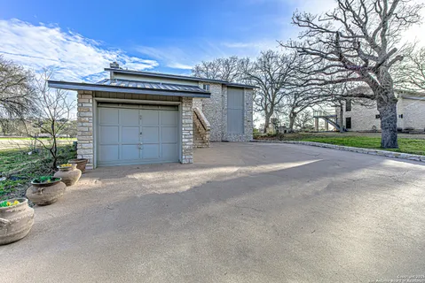 a view of a house with a street