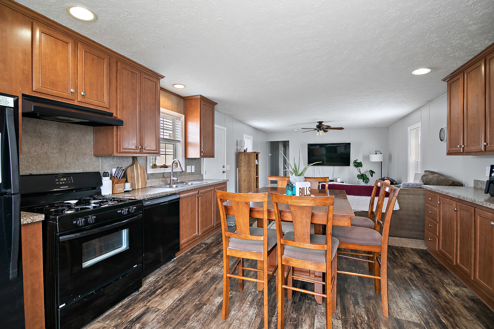 25 St Francis Drive Bourbonnais, IL 60914 - Photo 4 of 11 a large kitchen with a table and chairs in it