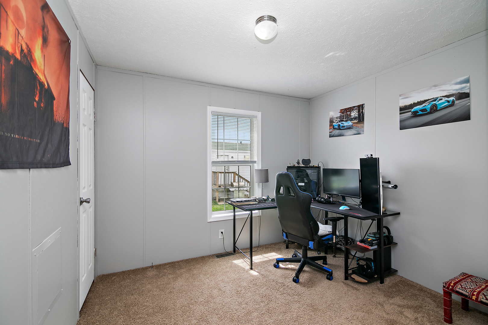 25 St Francis Drive Bourbonnais, IL 60914 - Photo 10 of 11 a view of a workspace with furniture and a window