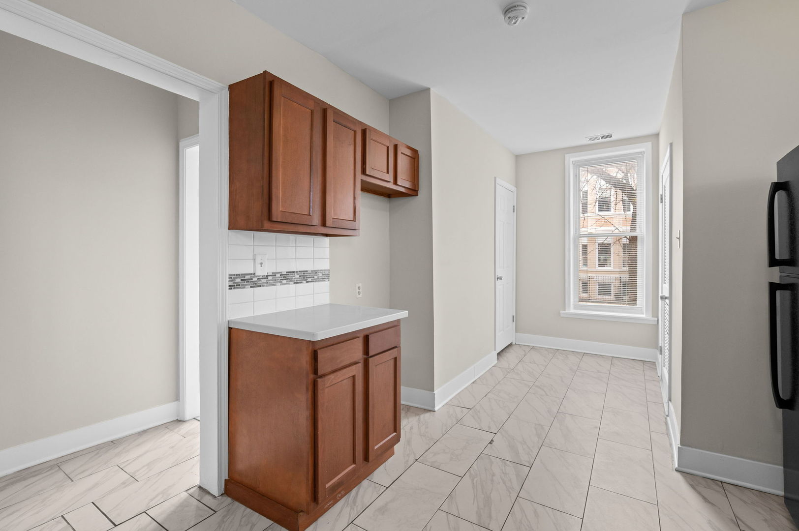 2756 West Monroe Street Chicago, IL 60612 - Photo 15 of 52 a kitchen with stainless steel appliances granite countertop a stove a refrigerator and a microwave