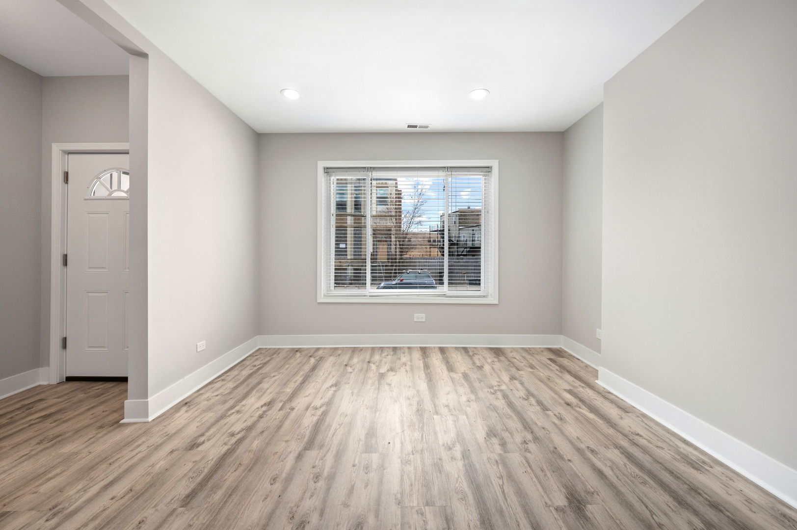 2756 West Monroe Street Chicago, IL 60612 - Photo 22 of 52 wooden floor in an empty room with a window