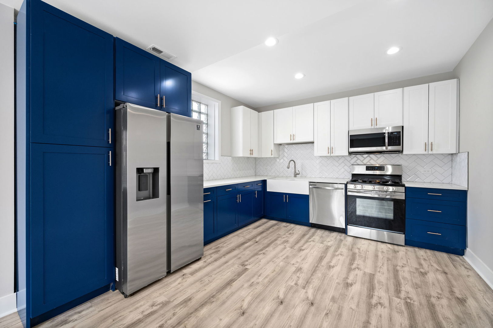 2756 West Monroe Street Chicago, IL 60612 - Photo 23 of 52 a kitchen with stainless steel appliances granite countertop a refrigerator stove and oven